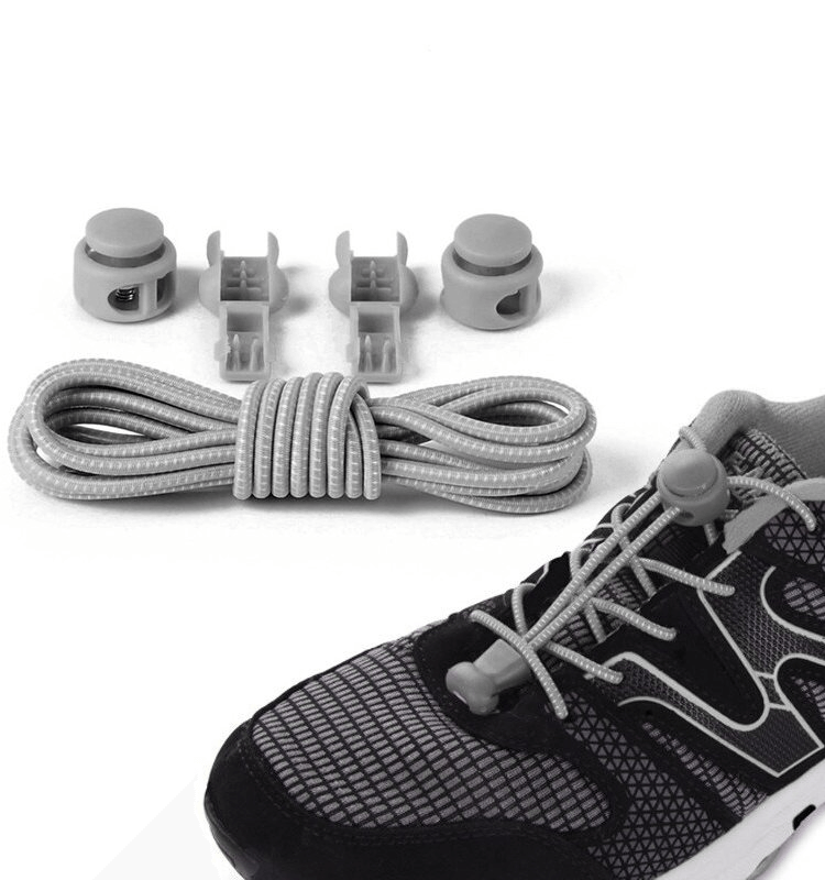 Stylish elastic laces for sports shoes with spring buckles, shown with installation on a sneaker. Perfect for no-tie convenience.
